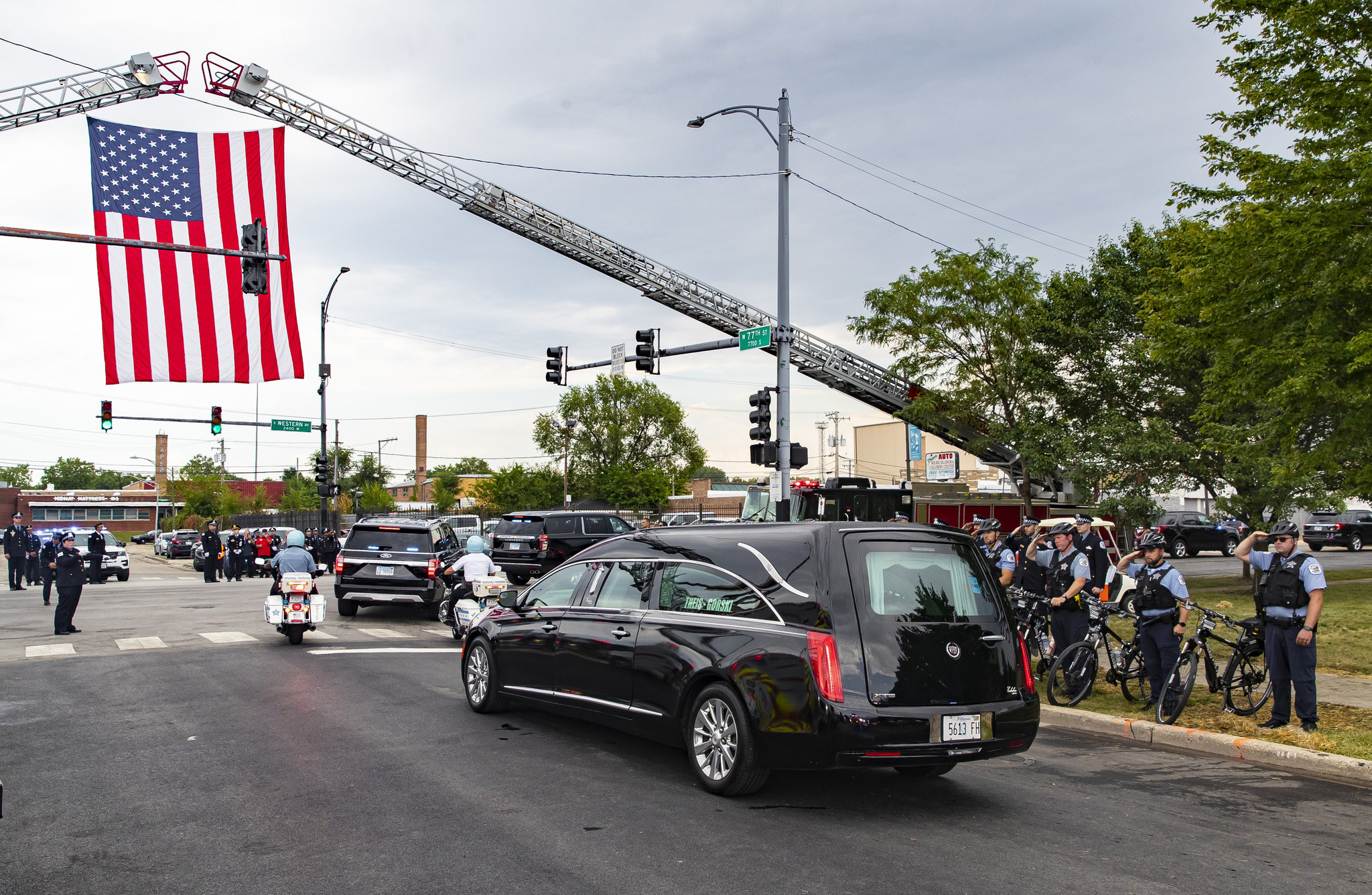 The procession for slain Chicago police Officer Ella French travels...