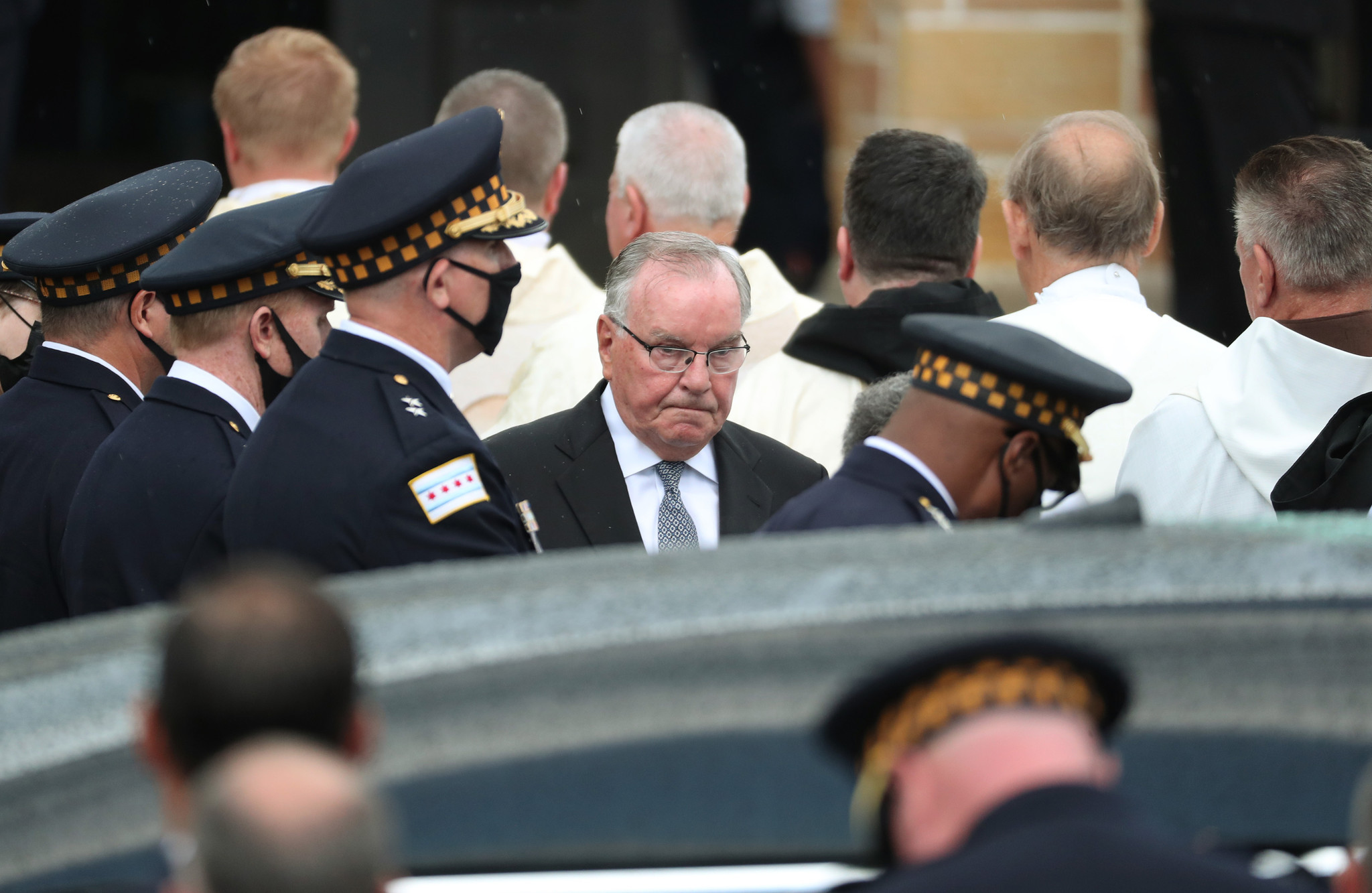 Former Mayor Richard M. Daley exits after the funeral for...