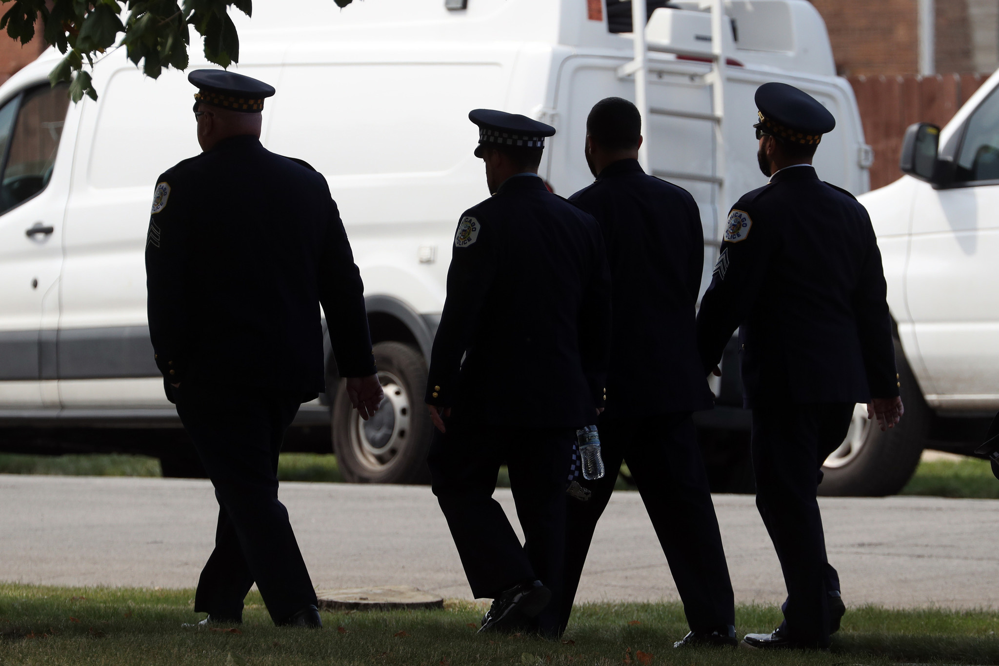 Mourners arrive at St. Rita of Cascia Shrine Chapel in...