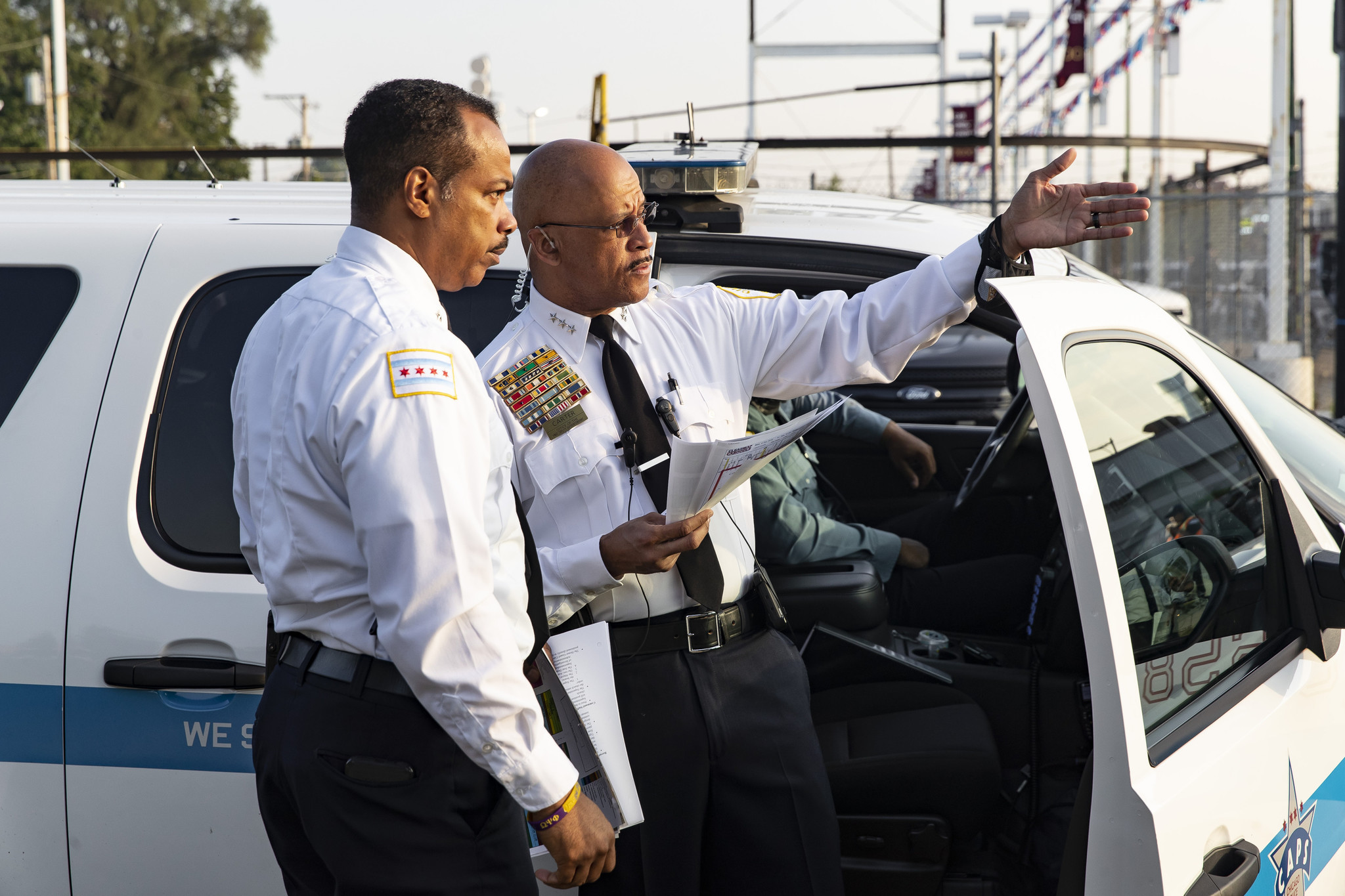 Chicago police First Deputy Superintendent Eric Carter, right, speaks with...