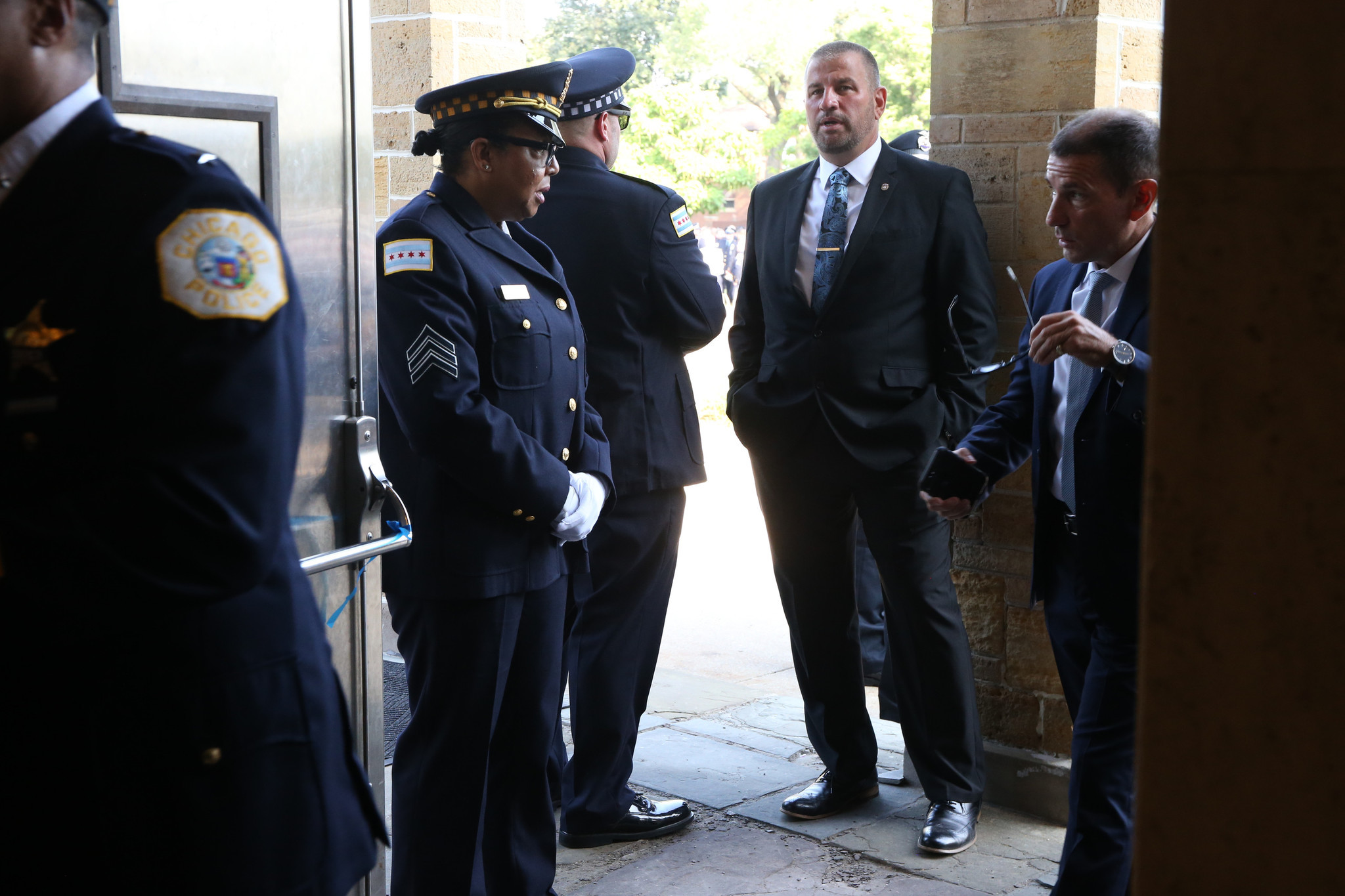 Fraternal Order of Police President John Catanzara, second from right,...