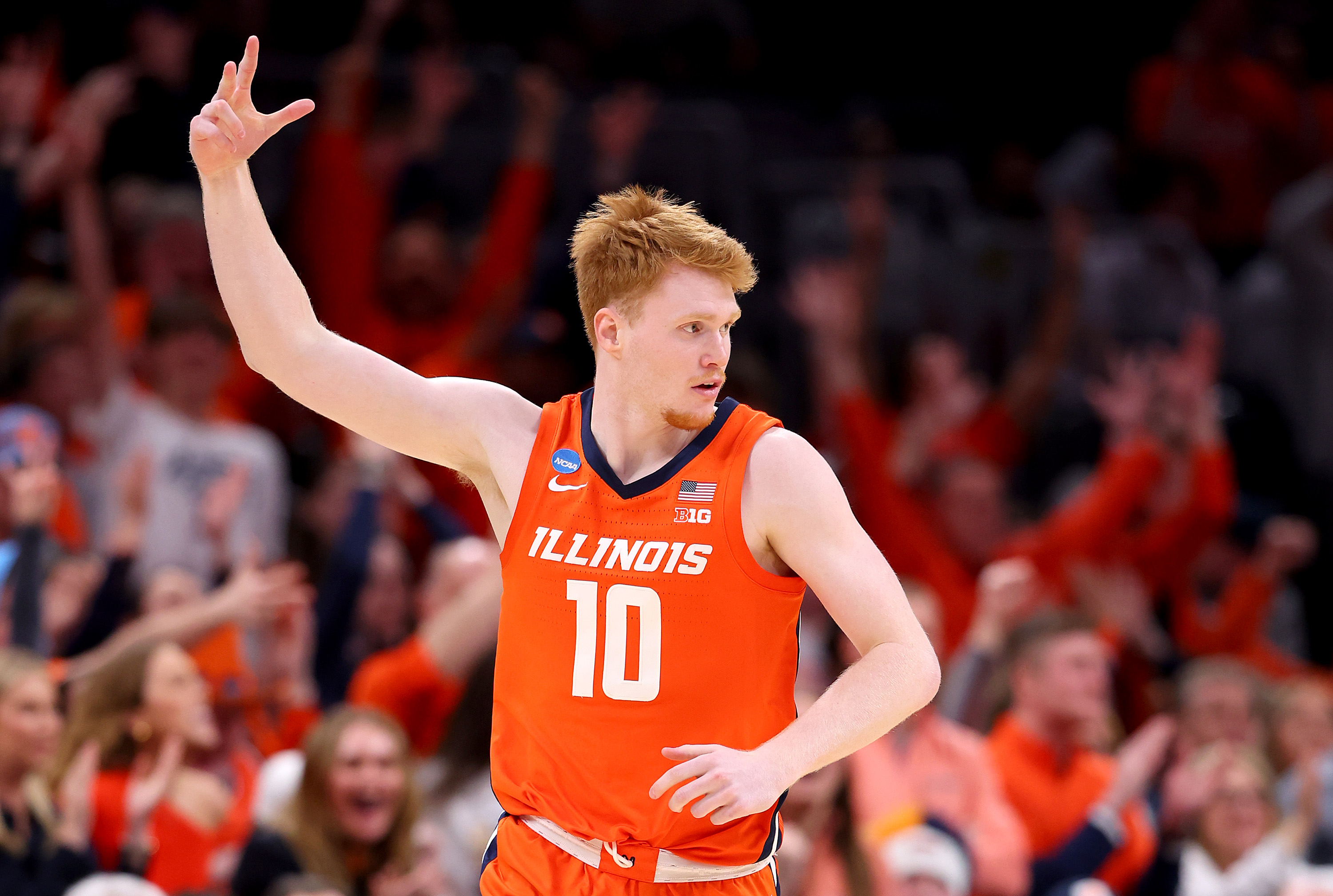 BOSTON, MASSACHUSETTS - MARCH 28: Luke Goode #10 of the Illinois Fighting Illini celebrates a three point basket against the Iowa State Cyclones during the second half in the Sweet 16 round of the NCAA Men's Basketball Tournament at TD Garden on March 28, 2024 in Boston, Massachusetts. (Photo by Michael Reaves/Getty Images)