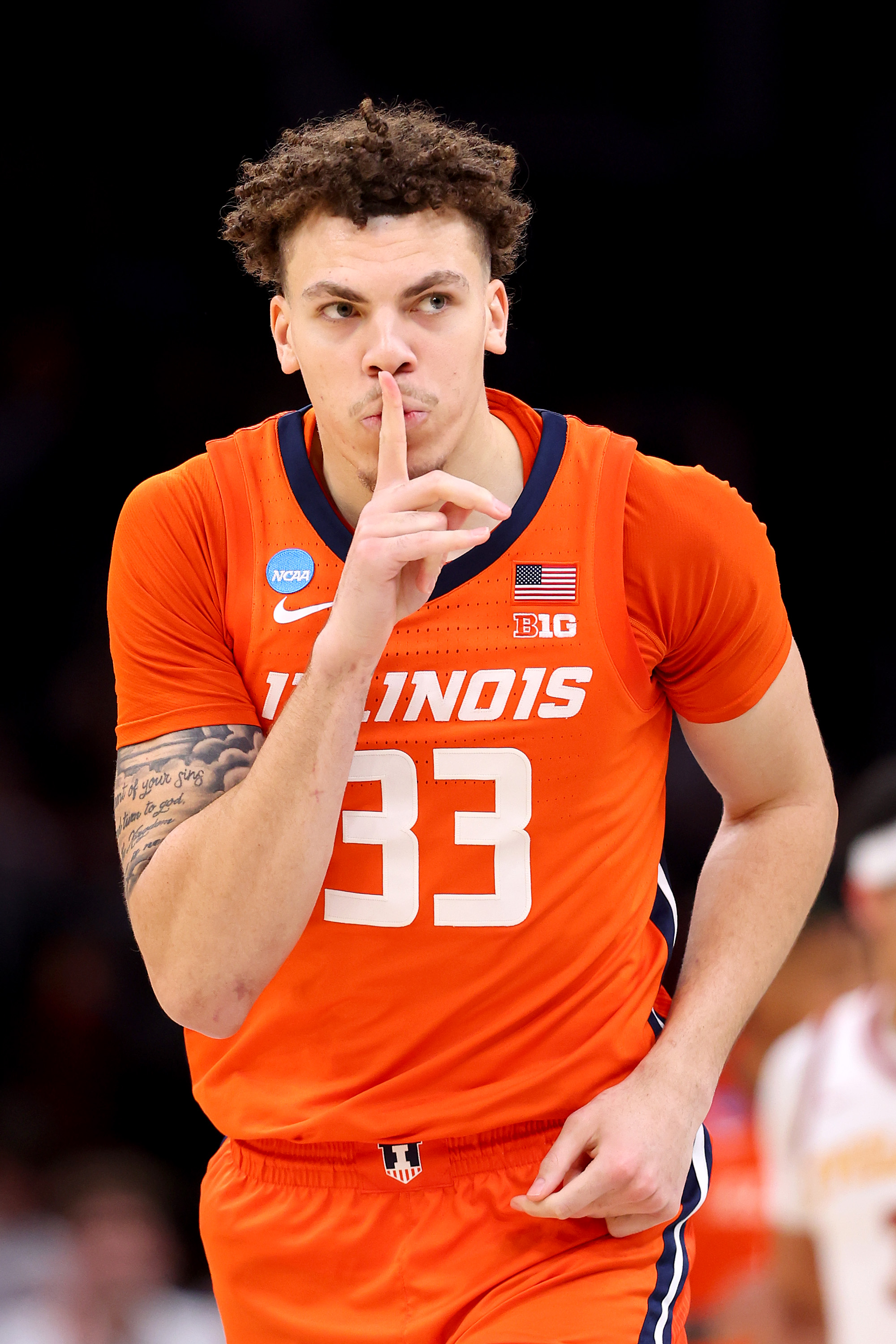 BOSTON, MASSACHUSETTS - MARCH 28: Coleman Hawkins #33 of the Illinois Fighting Illini celebrates a basket against the Iowa State Cyclones during the second half in the Sweet 16 round of the NCAA Men's Basketball Tournament at TD Garden on March 28, 2024 in Boston, Massachusetts. (Photo by Michael Reaves/Getty Images)