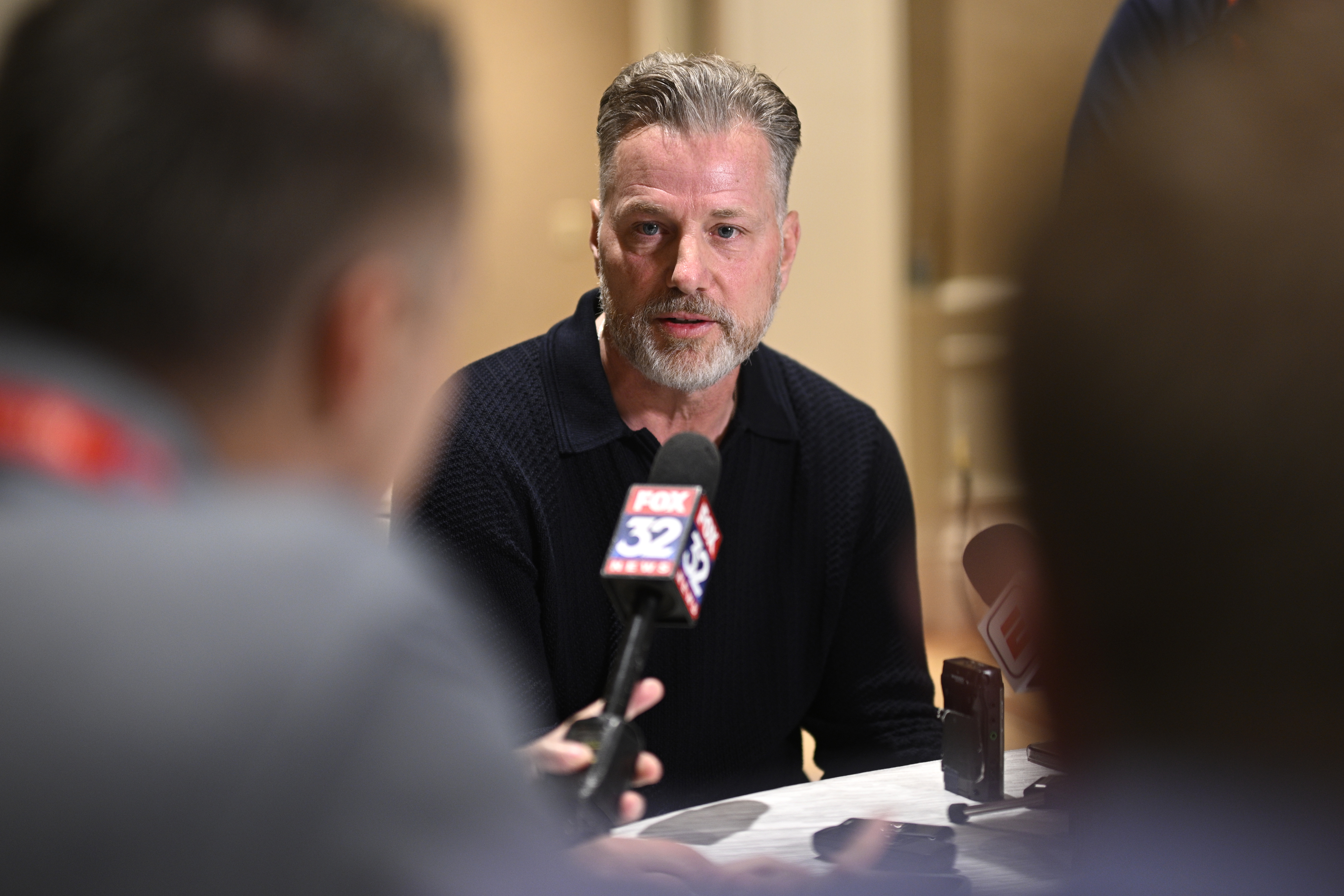 Chicago Bears head football coach Matt Eberflus, center, talks with reporters during an NFC coaches availability at the NFL football owners meetings, Tuesday, March 26, 2024, in Orlando, Fla. (AP Photo/Phelan M. Ebenhack)