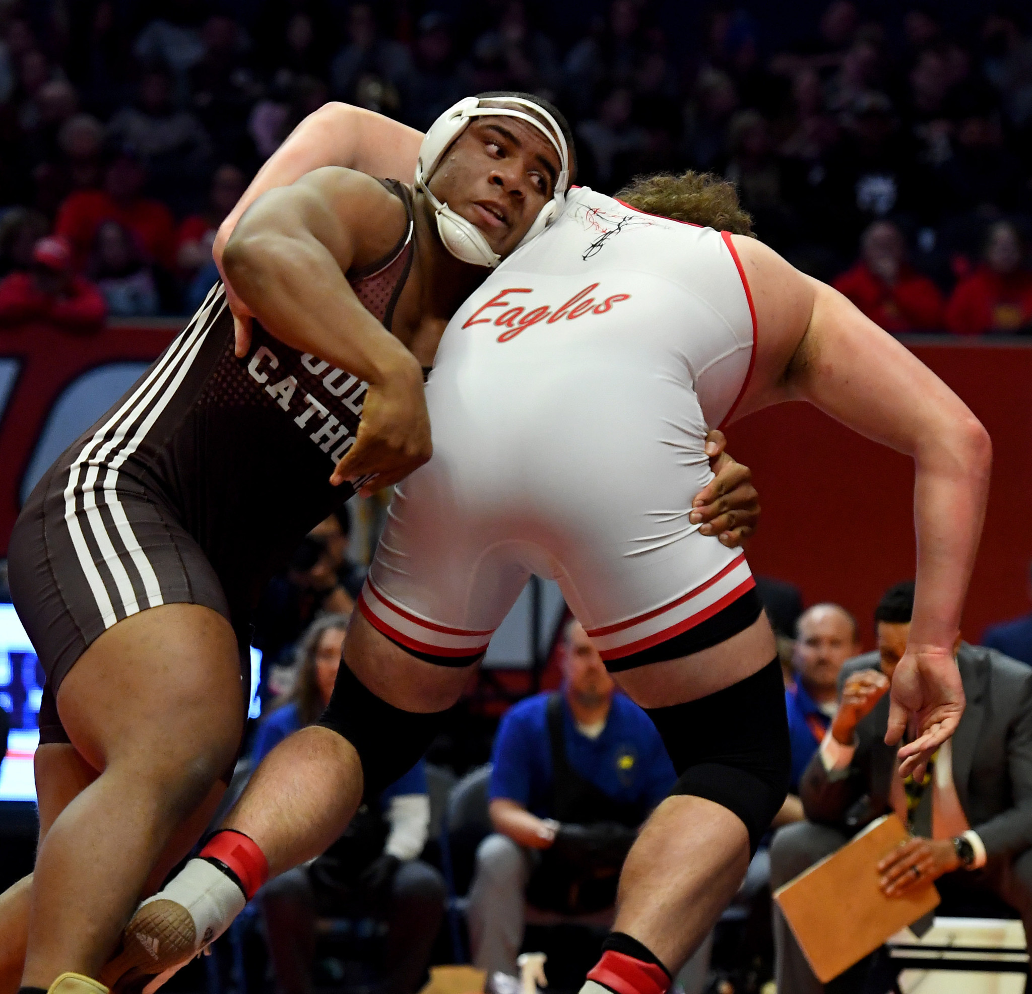 Joliet Catholic's Dillan Johnson takes down Aurora Christian's Braden Hunter in the 285-pound championship match of the Class 2A state meet at the University of Illinois' State Farm Center in Champaign on Saturday, Feb. 18, 2023.