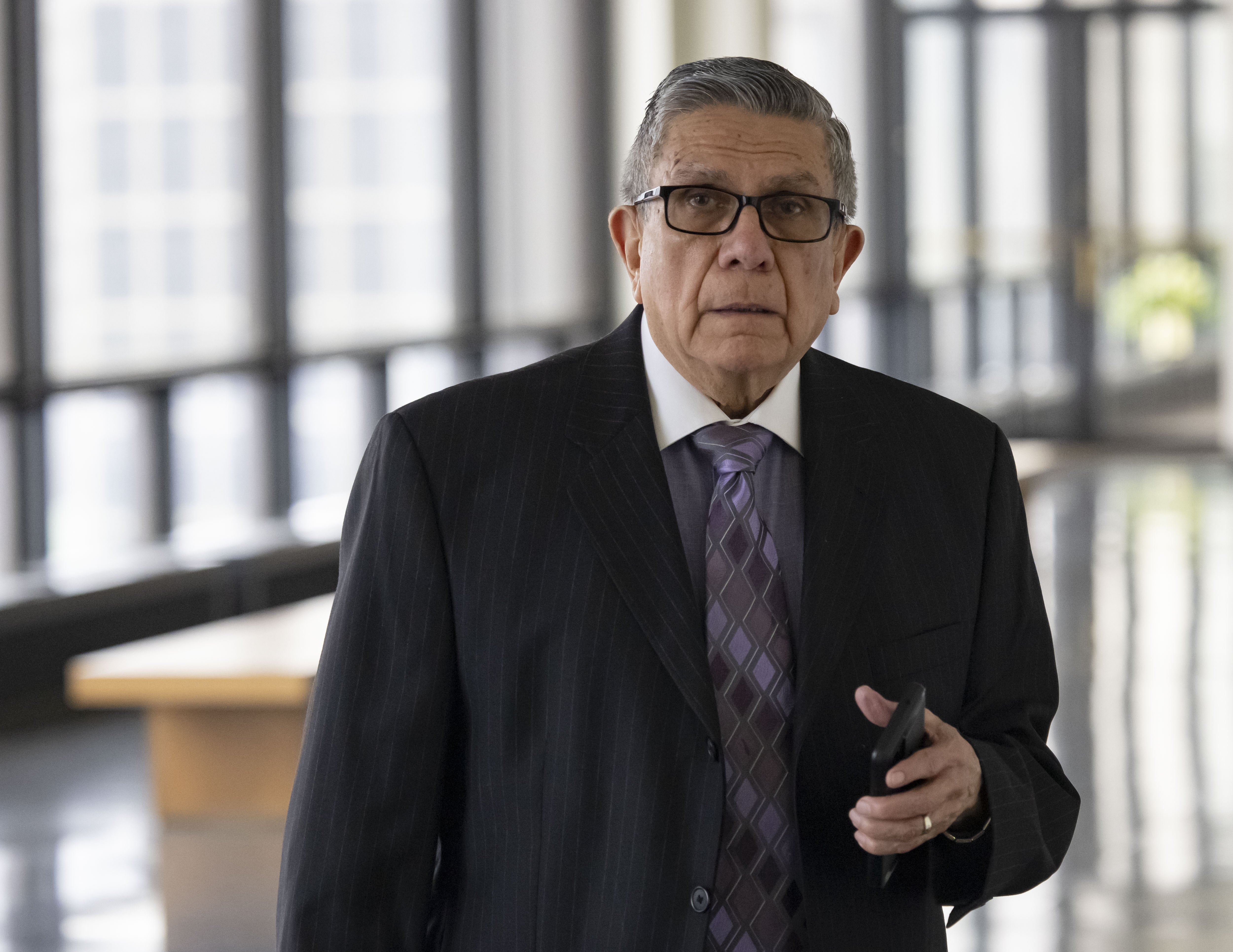 Dr. Fabio Ortega walks outside a courtroom at the Daley Center on March 22, 2023. (Brian Cassella/Chicago Tribune)