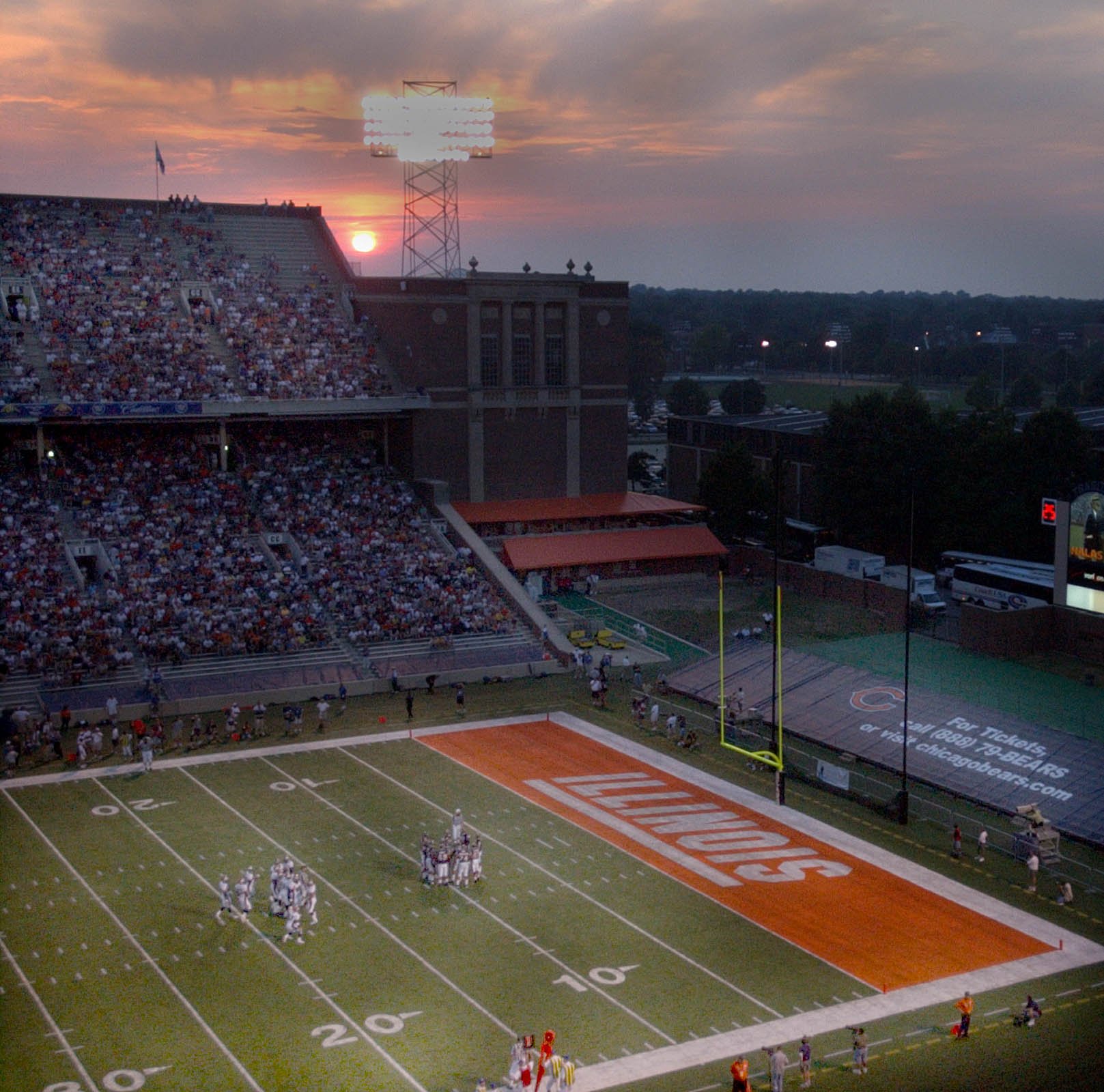 A beautiful sunset over Memorial Stadium in Champaign, Ill. where the Chicago Bears played the Denver Broncos during a preseason game on Aug. 10, 2002. The Broncos won 27-3.