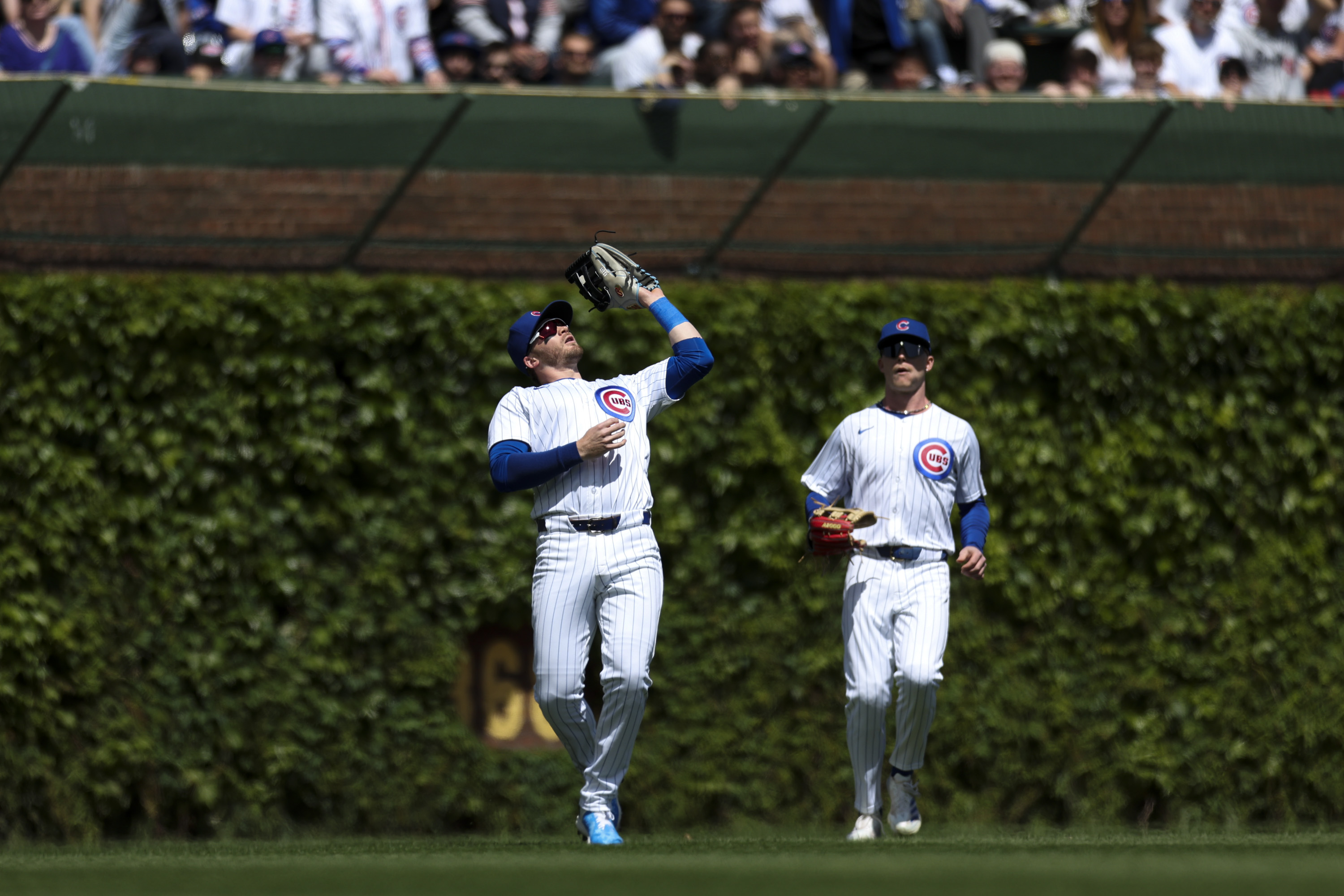 Chicago Cubs outfielder Ian Happ (8) catches a fly ball during the second inning against the Milwaukee Brewers at Wrigley Field on May 5, 2024. (Eileen T. Meslar/Chicago Tribune)