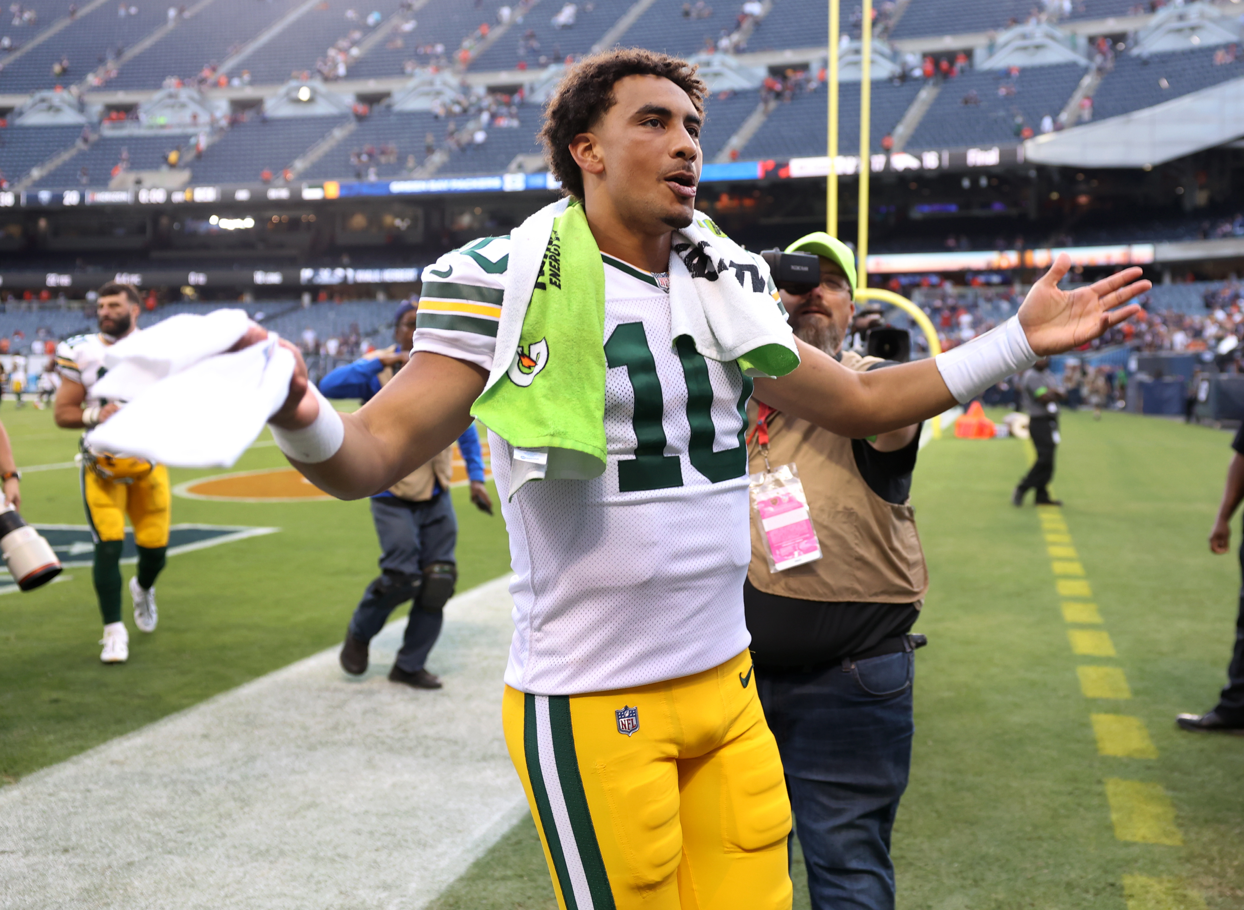 Packers quarterback Jordan Love runs off the field after a victory over the Bears at Soldier Field on Sept. 10, 2023. (Chris Sweda/Chicago Tribune)