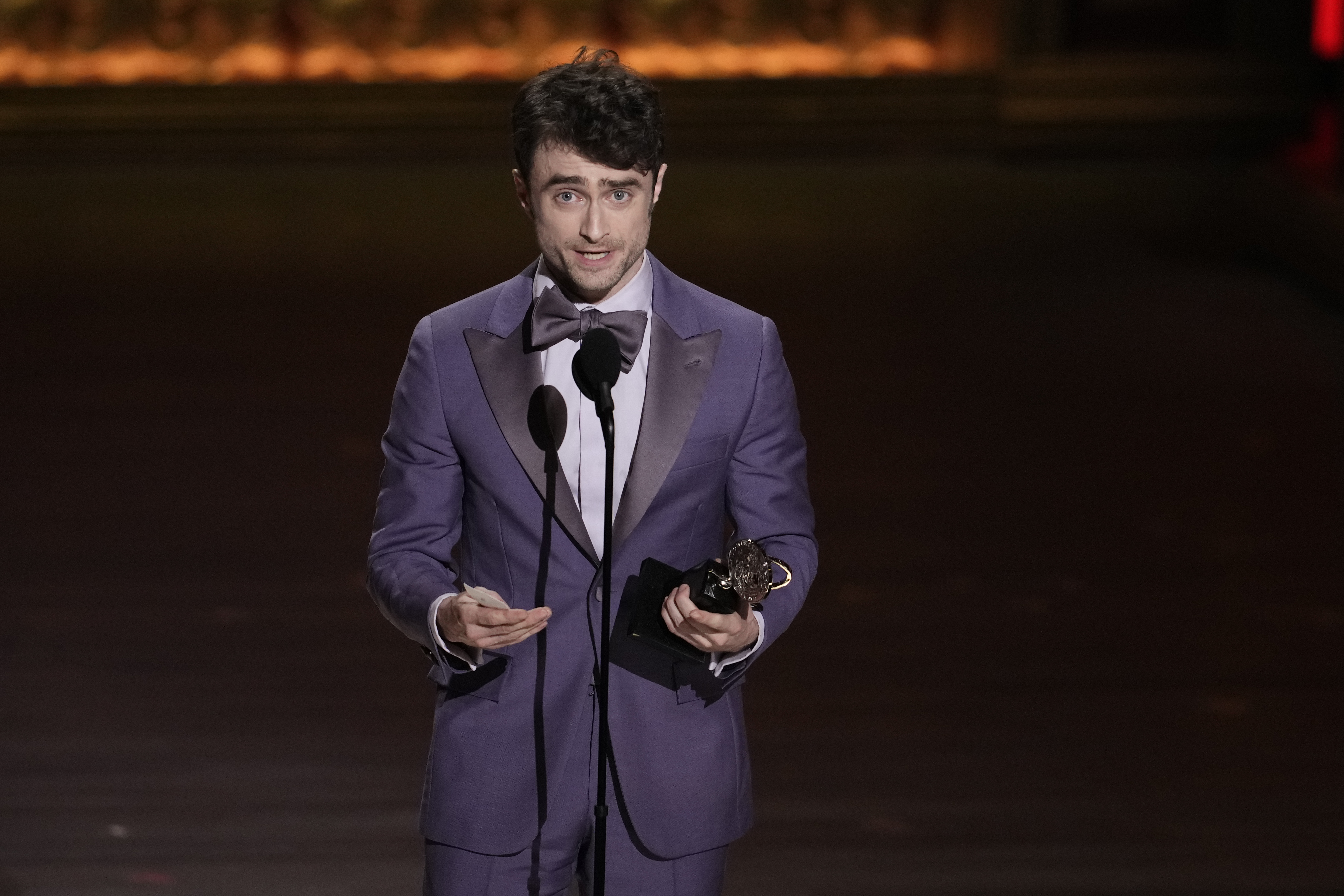 Daniel Radcliffe accepts the award for best performance by an...