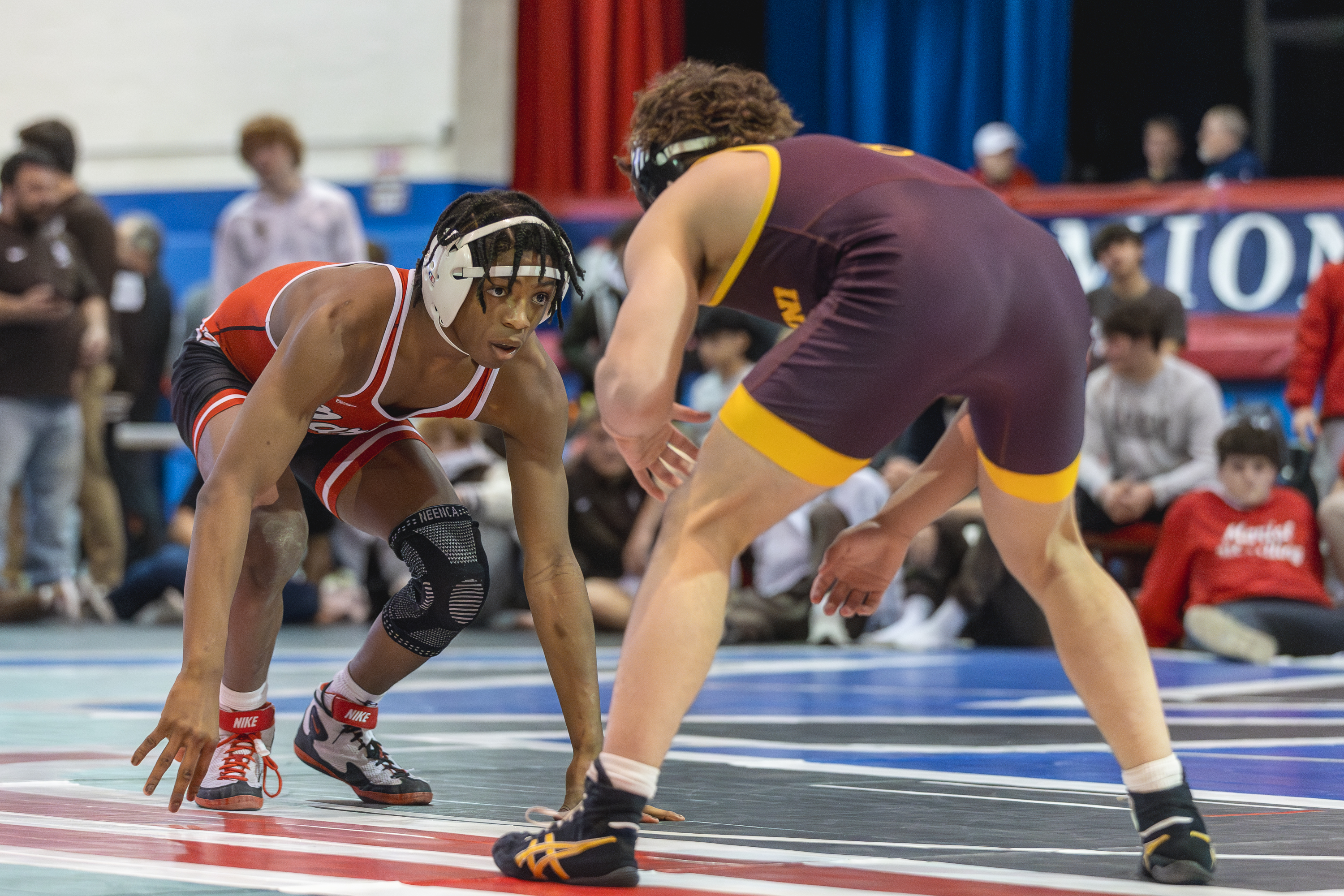 Marist's Te'Jon Beals wrestles against Montini's Mikey Malizzio during a 132 pound match in the Class 3A Marmion Dual Team sectional l in Aurora on Thursday, Feb. 4, 2026. (Troy Stolt for the Beacon News)
