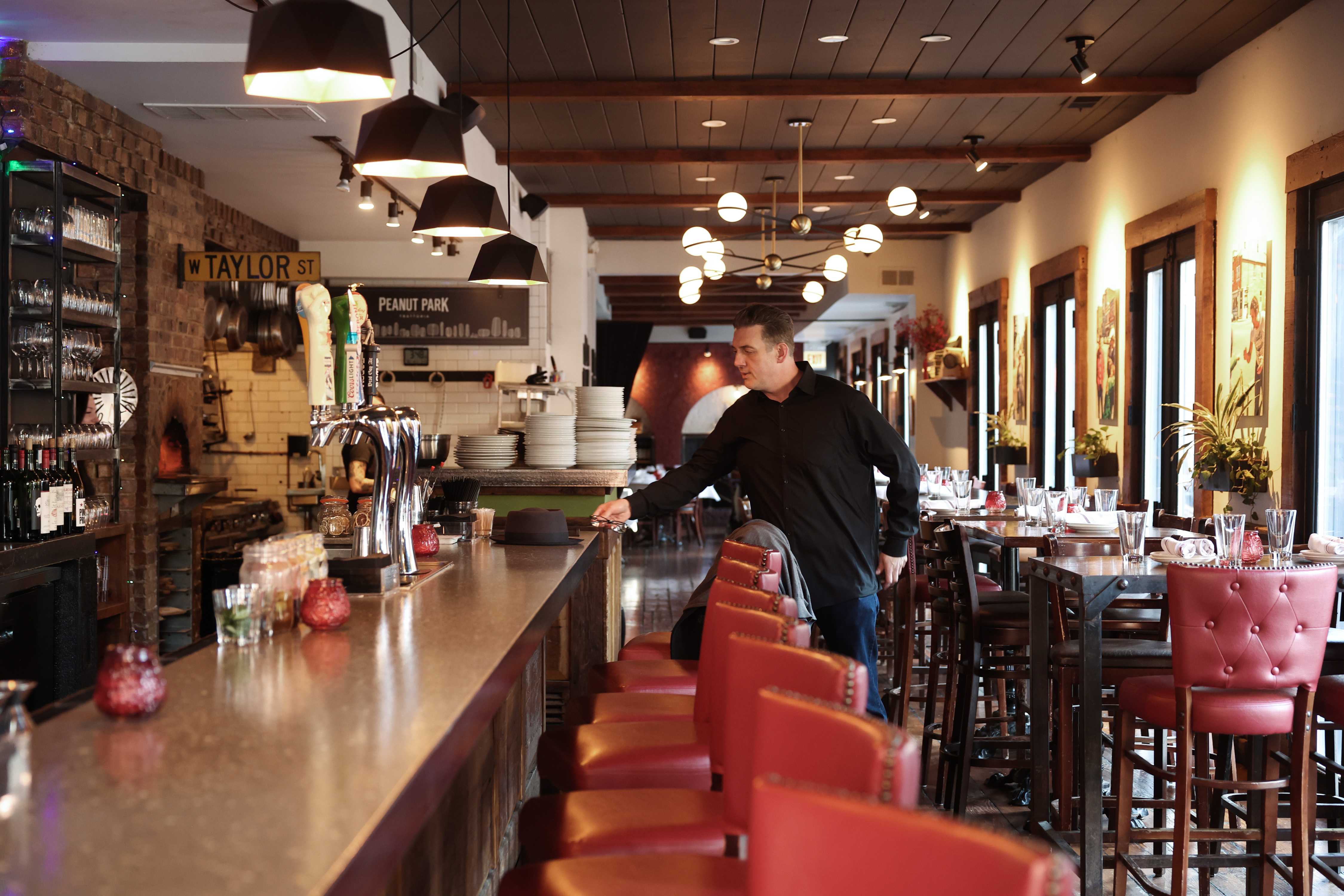 Restauranteur David Bonomi arrives at his restaurant, Peanut Park Trattoria, in Chicago's Little Italy neighborhood on Feb. 25, 2026. (John J. Kim/Chicago Tribune)
